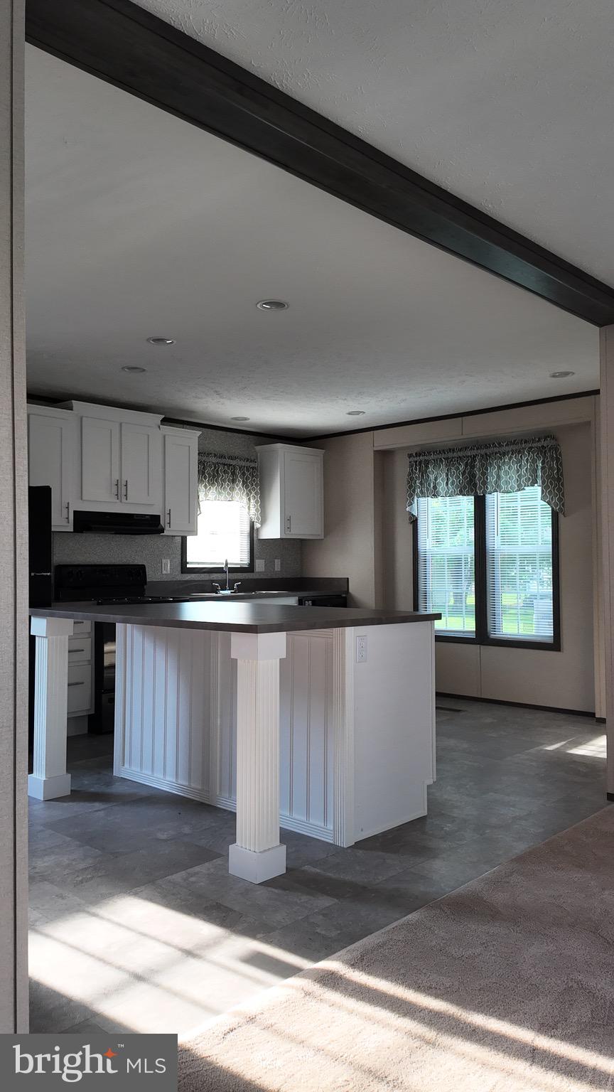 2110 Scull Street Lebanon, PA 17046 - Photo 4 of 13 a kitchen with a refrigerator and a stove top oven