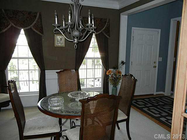 310 Prestmont Court Fort Mill, SC 29708 - Photo 4 of 13 a dining room with furniture and window