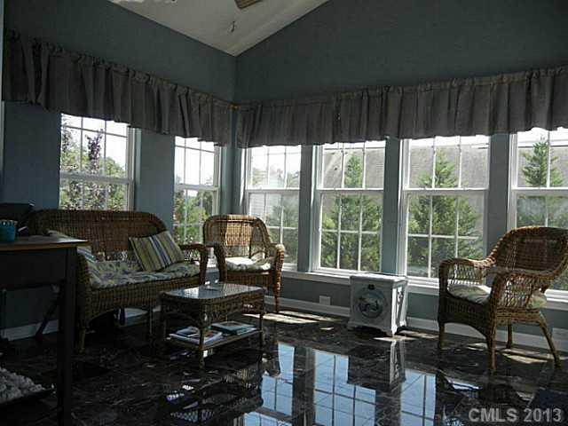 310 Prestmont Court Fort Mill, SC 29708 - Photo 7 of 13 a living room with furniture and large windows