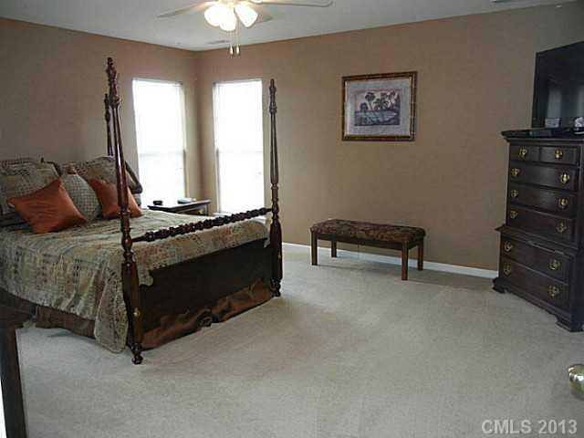 310 Prestmont Court Fort Mill, SC 29708 - Photo 10 of 13 a living room with furniture and a flat screen tv
