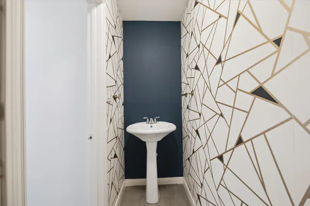 a view of washer and dryer with wooden floor