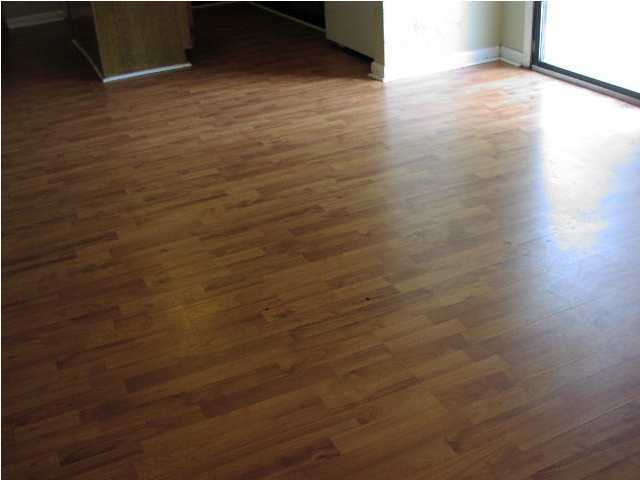 250 Boundry Line Road Freeport, FL 32439 - Photo 9 of 21 Hardwood laminate floors in dining room