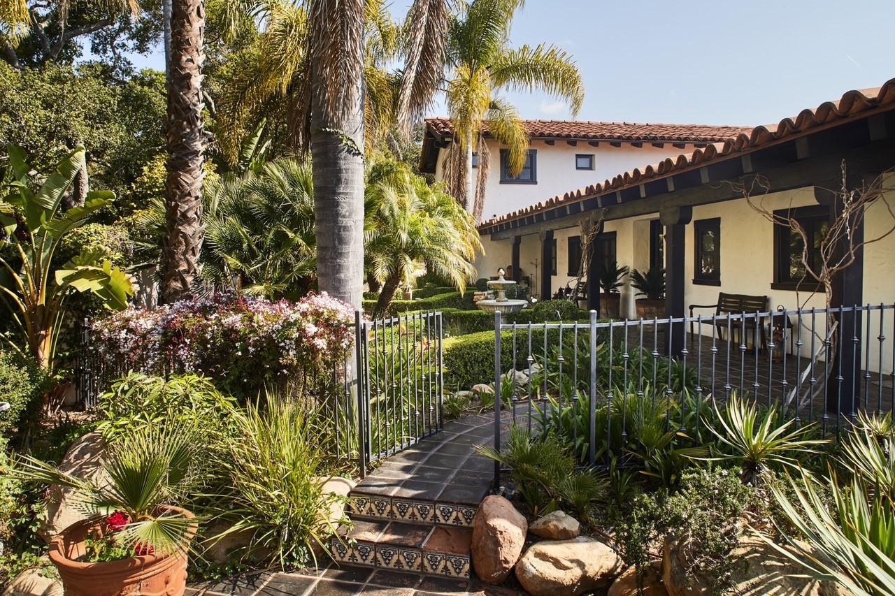 660 El Bosque Road Montecito, CA 93108 - Photo 11 of 34 a view of a house with a garden and pathway
