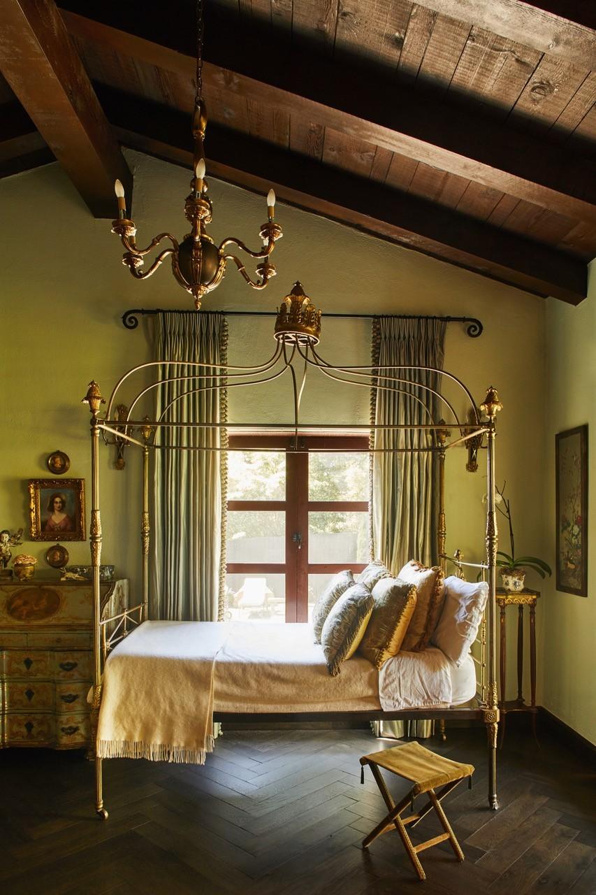 660 El Bosque Road Montecito, CA 93108 - Photo 17 of 34 a bedroom with a bed a table and chair