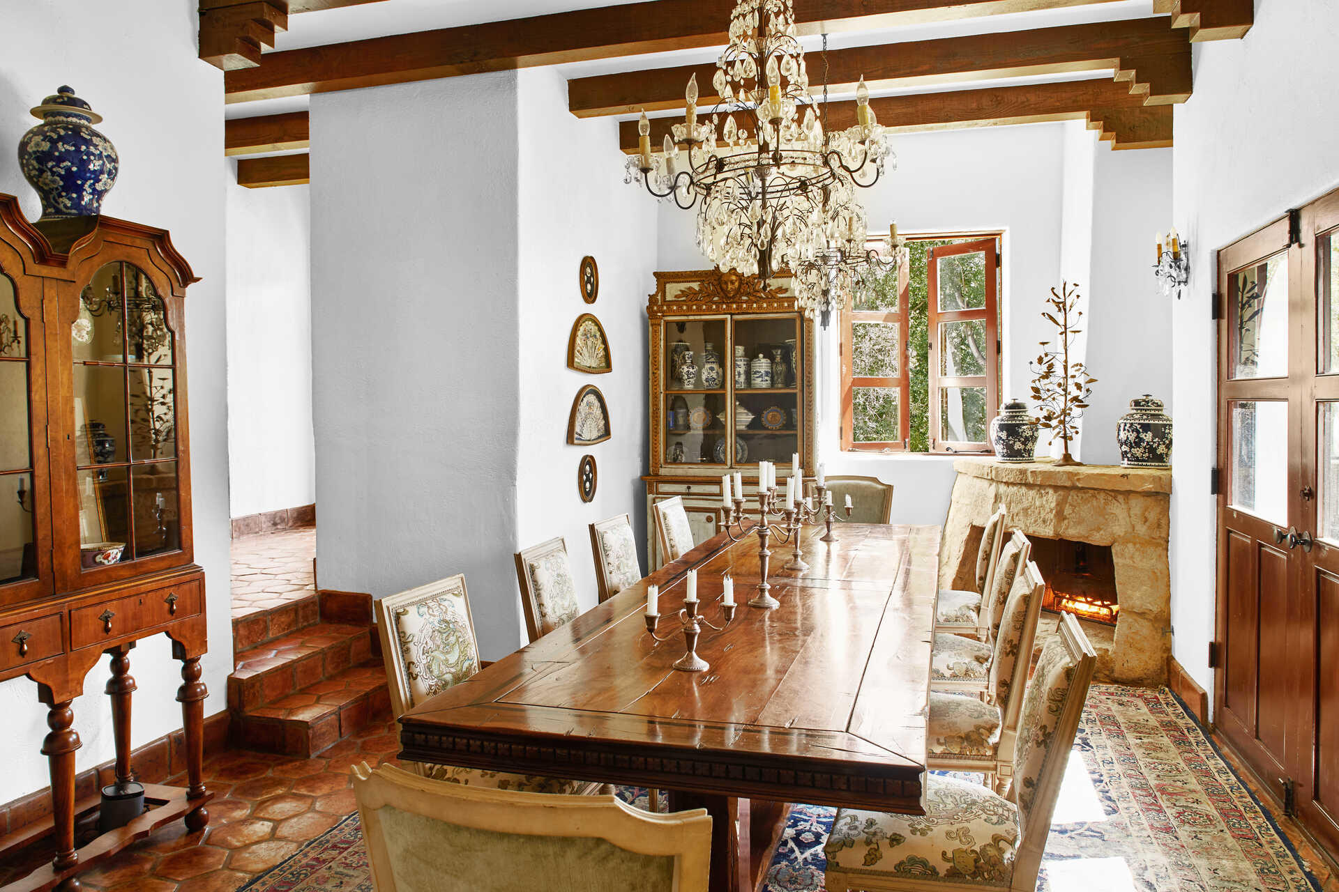 660 El Bosque Road Montecito, CA 93108 - Photo 18 of 34 a view of a dining room with furniture and chandelier