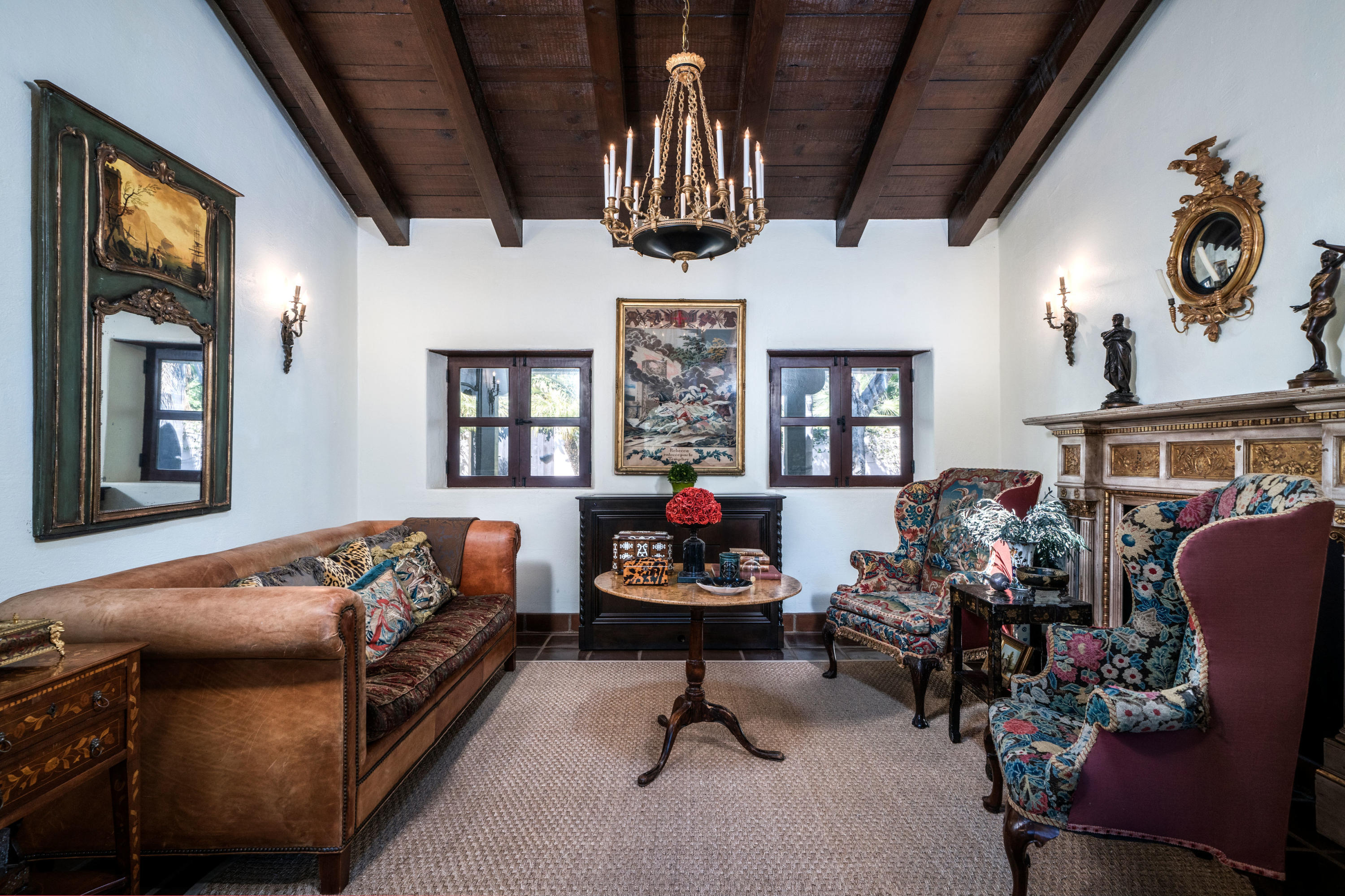 660 El Bosque Road Montecito, CA 93108 - Photo 21 of 34 a living room with furniture toys and a chandelier