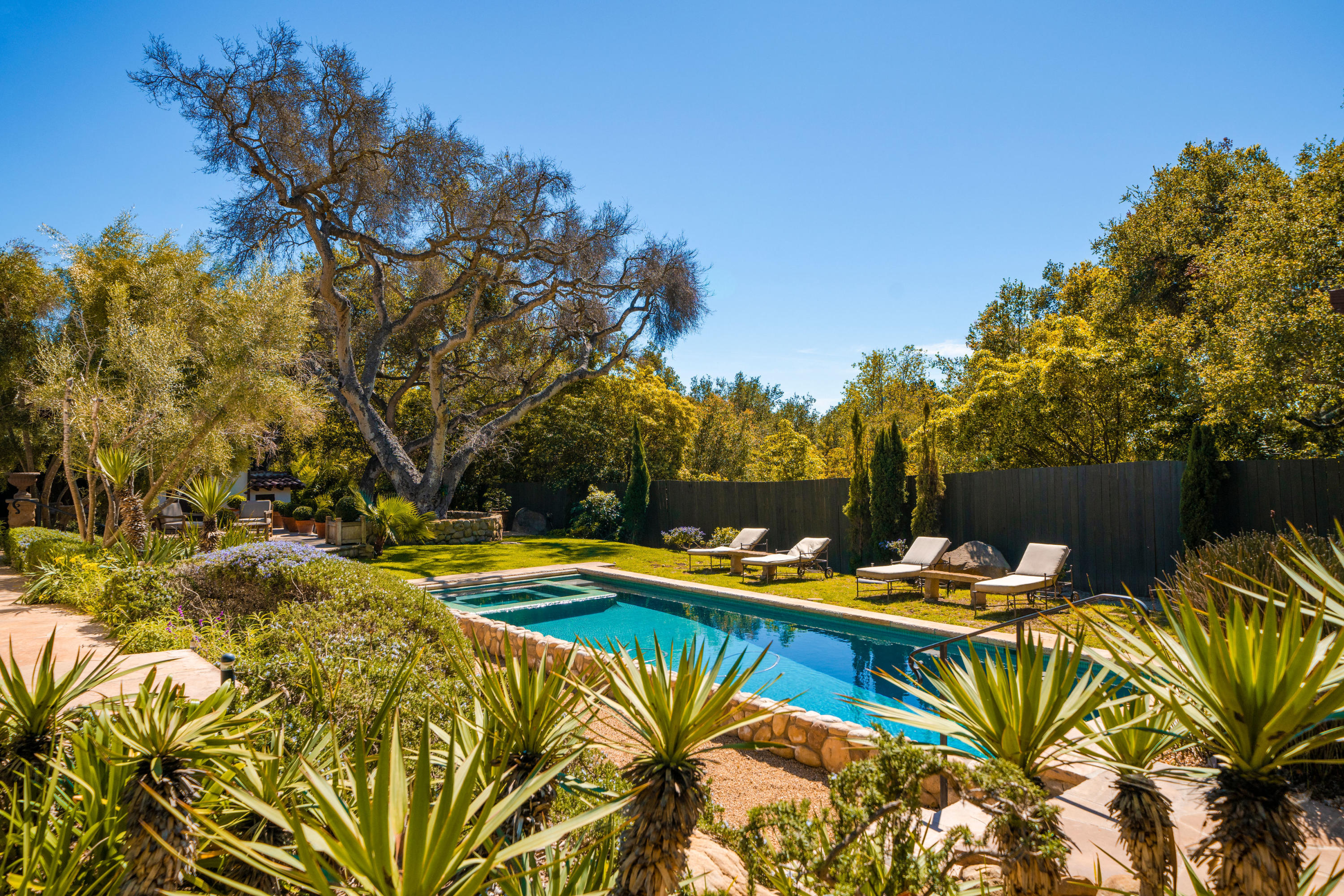 660 El Bosque Road Montecito, CA 93108 - Photo 23 of 34 a view of a swimming pool with lounge chairs