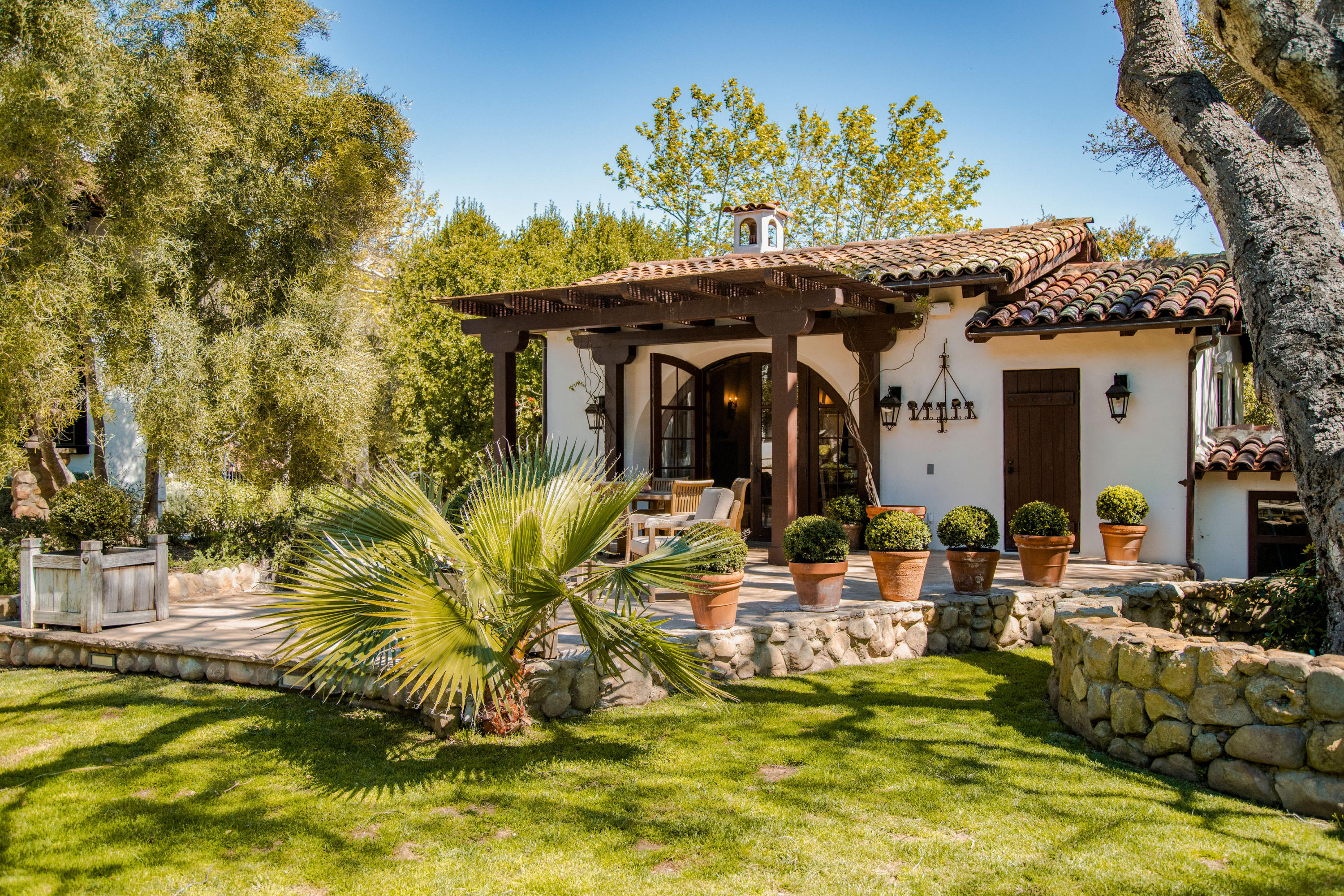660 El Bosque Road Montecito, CA 93108 - Photo 24 of 34 a view of a house with a swimming pool