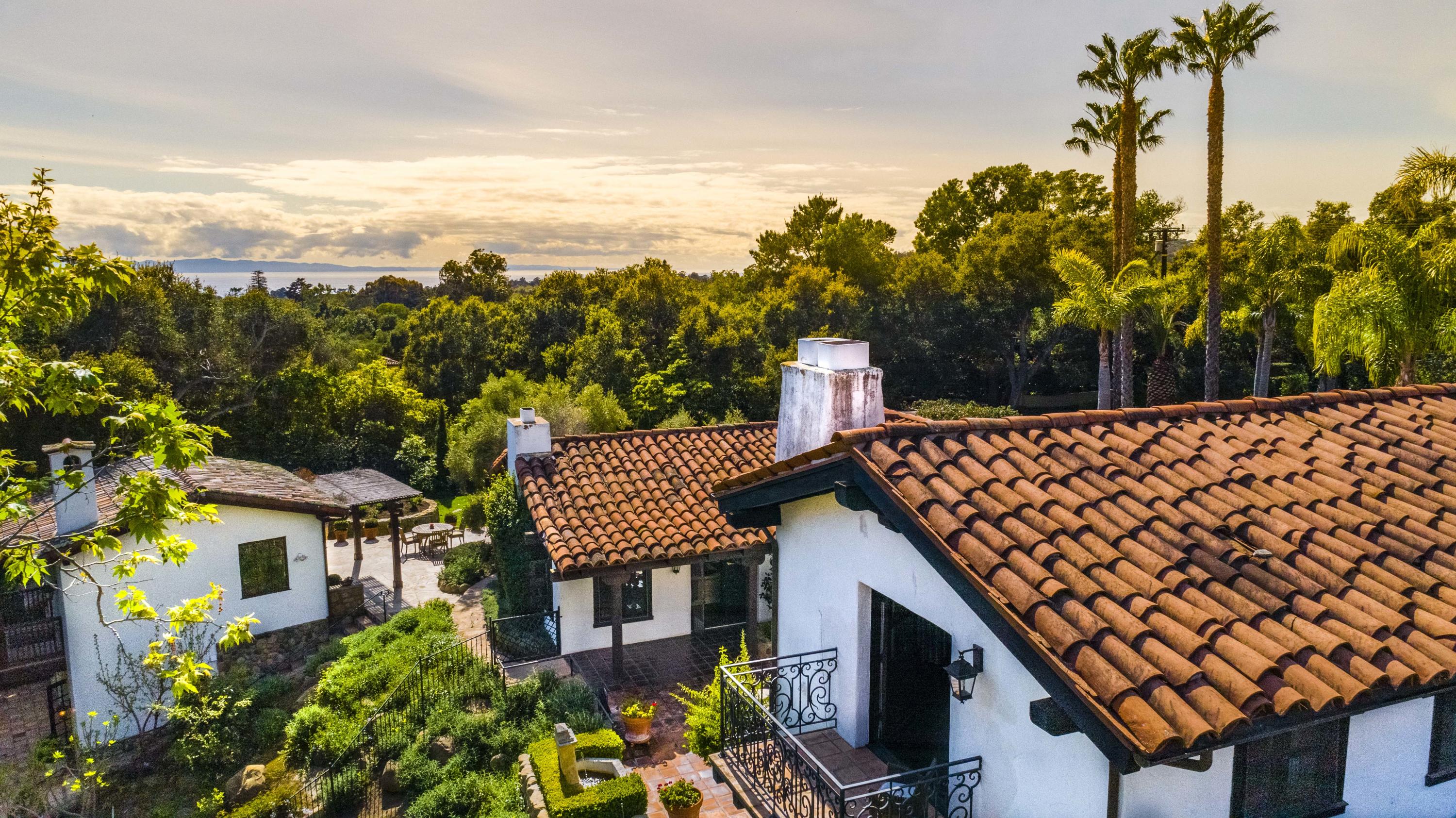 660 El Bosque Road Montecito, CA 93108 - Photo 33 of 34 a backyard of a house with lots of green space
