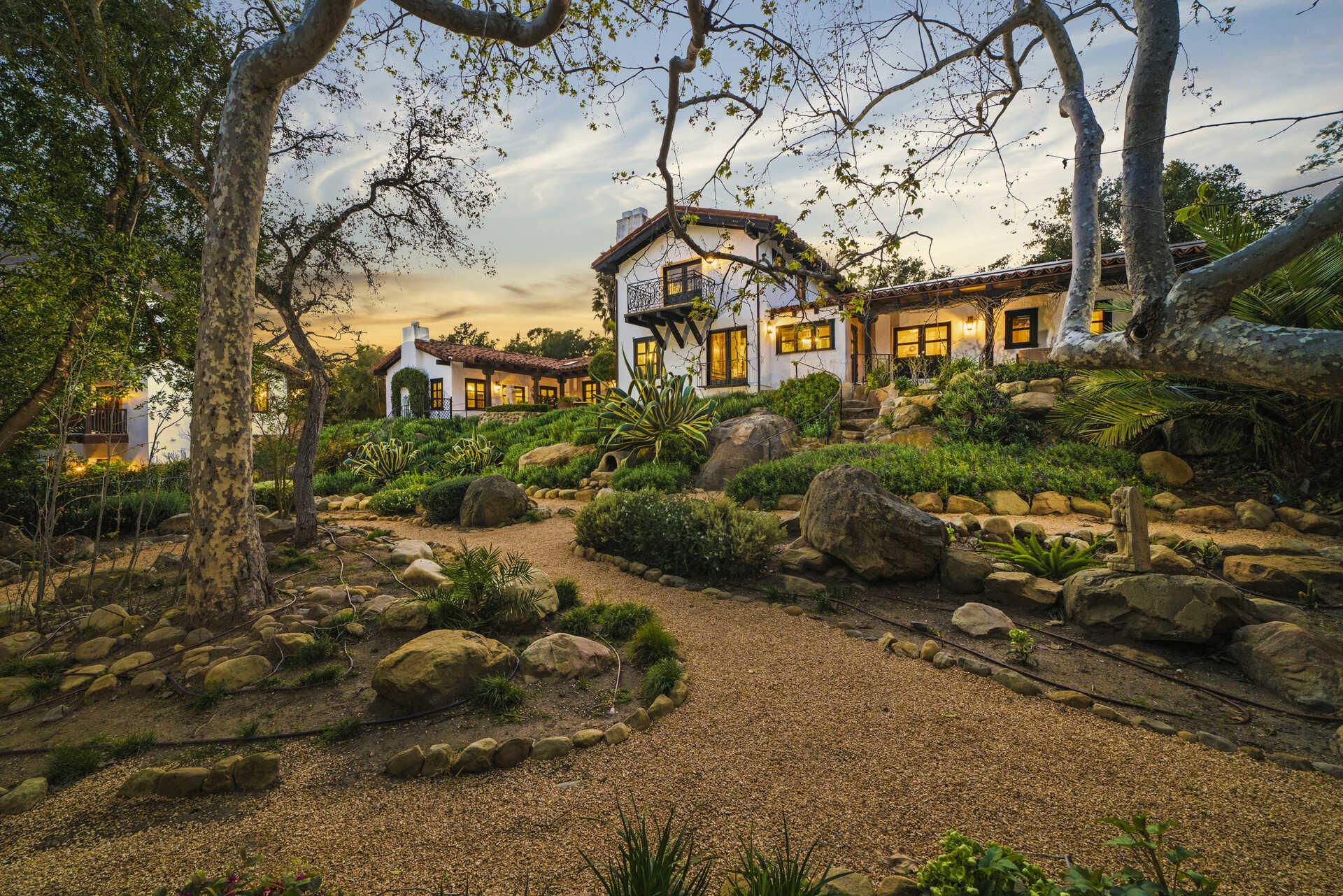 660 El Bosque Road Montecito, CA 93108 - Photo 4 of 34 a front view of a house with a garden