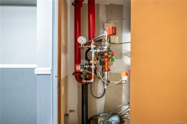 a brick building with a door and a window
