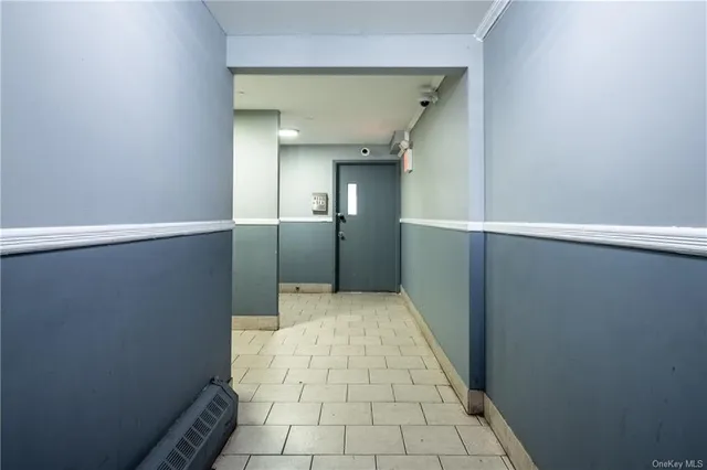 a front view of a house with a glass door