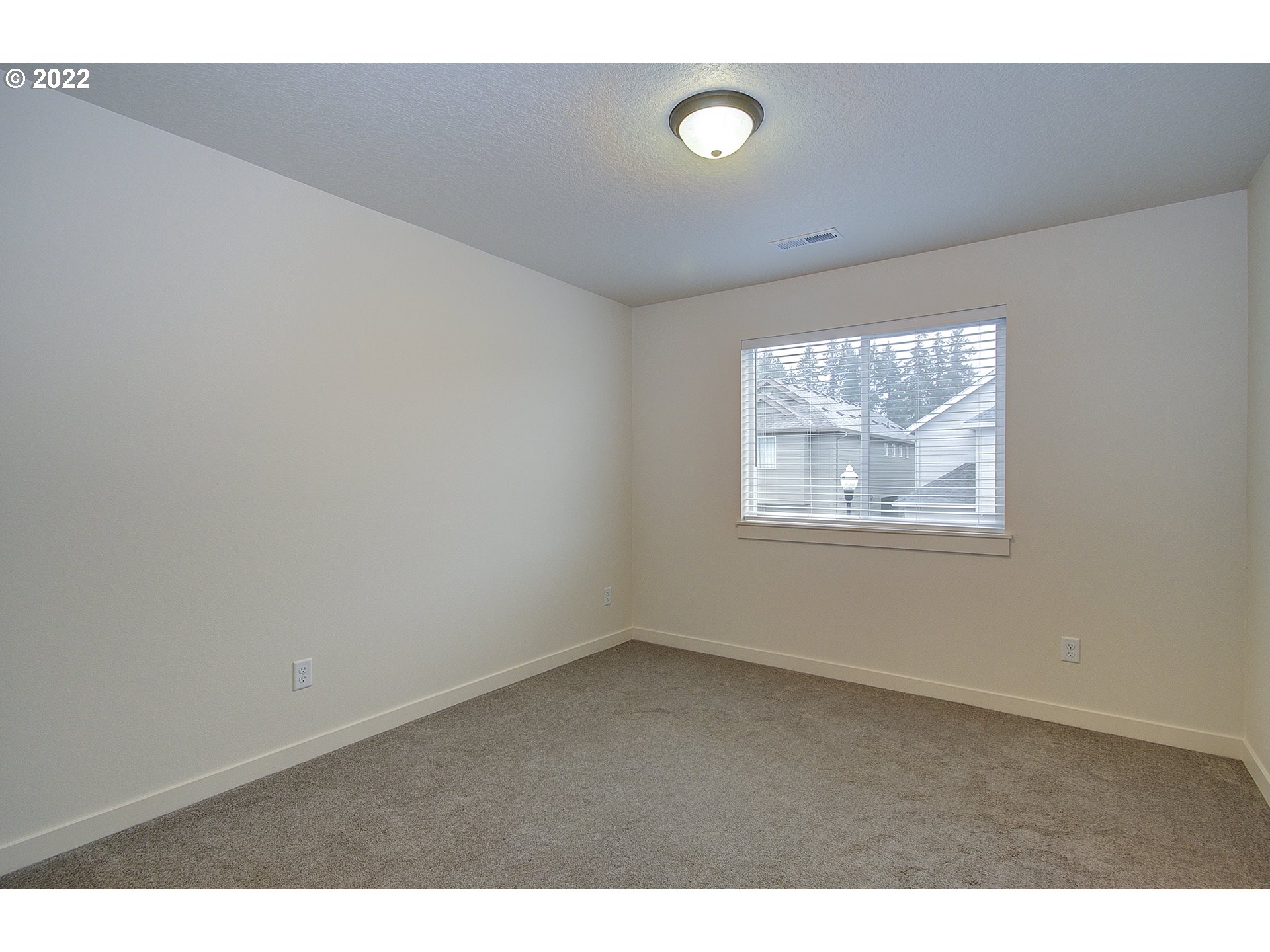 7107 South 11th Street Ridgefield, WA 98642 - Photo 19 of 26 an empty room with windows