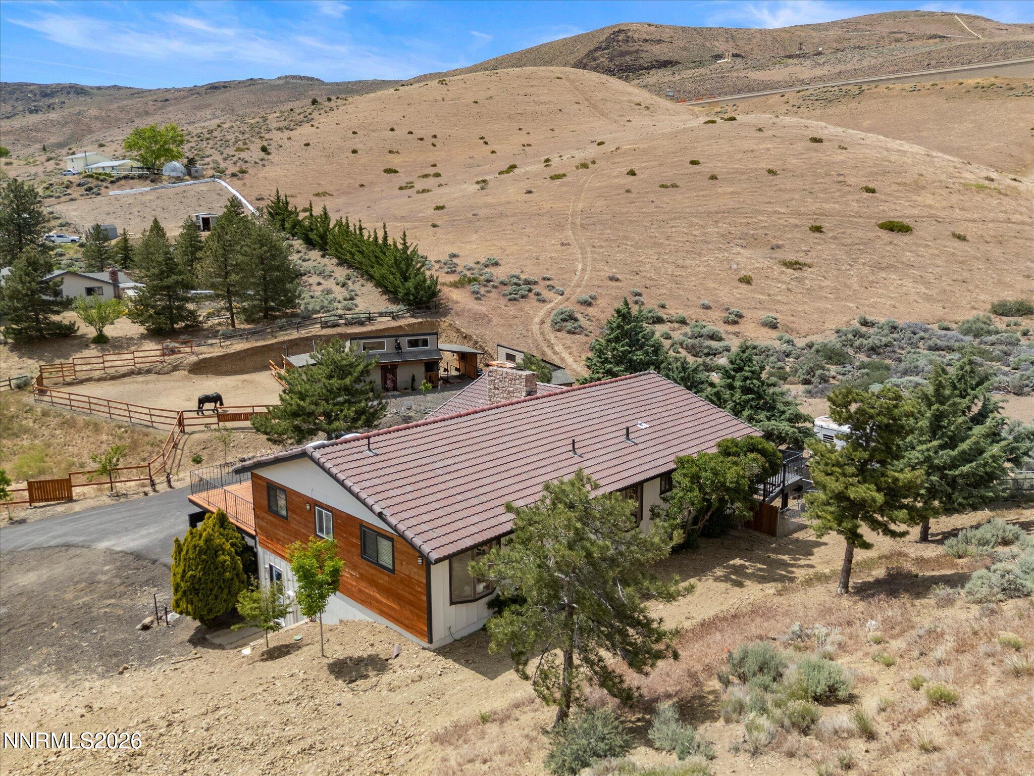 20449 Temelec Way Reno, NV 89521 - Photo 50 of 65 a view of a terrace with a mountain