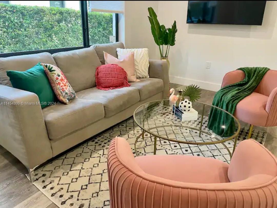 2141 Southwest 14th Terrace Miami, FL 33145 - Photo 14 of 47 a view of a couch in a living room
