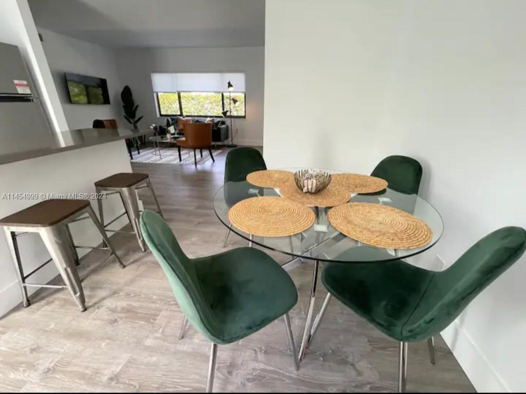 2141 Southwest 14th Terrace Miami, FL 33145 - Photo 21 of 47 a view of a dining room with furniture