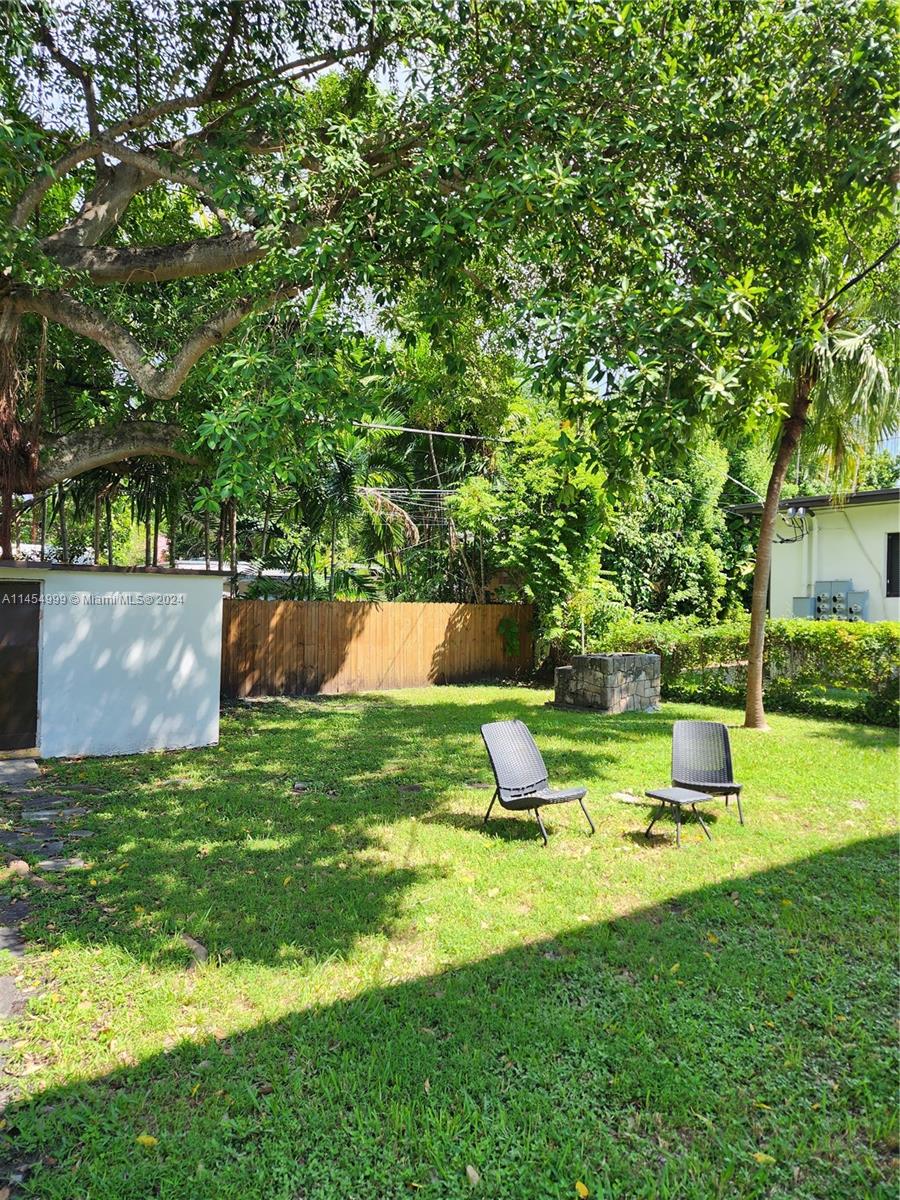 2141 Southwest 14th Terrace Miami, FL 33145 - Photo 29 of 47 a view of an house with backyard space and sitting area