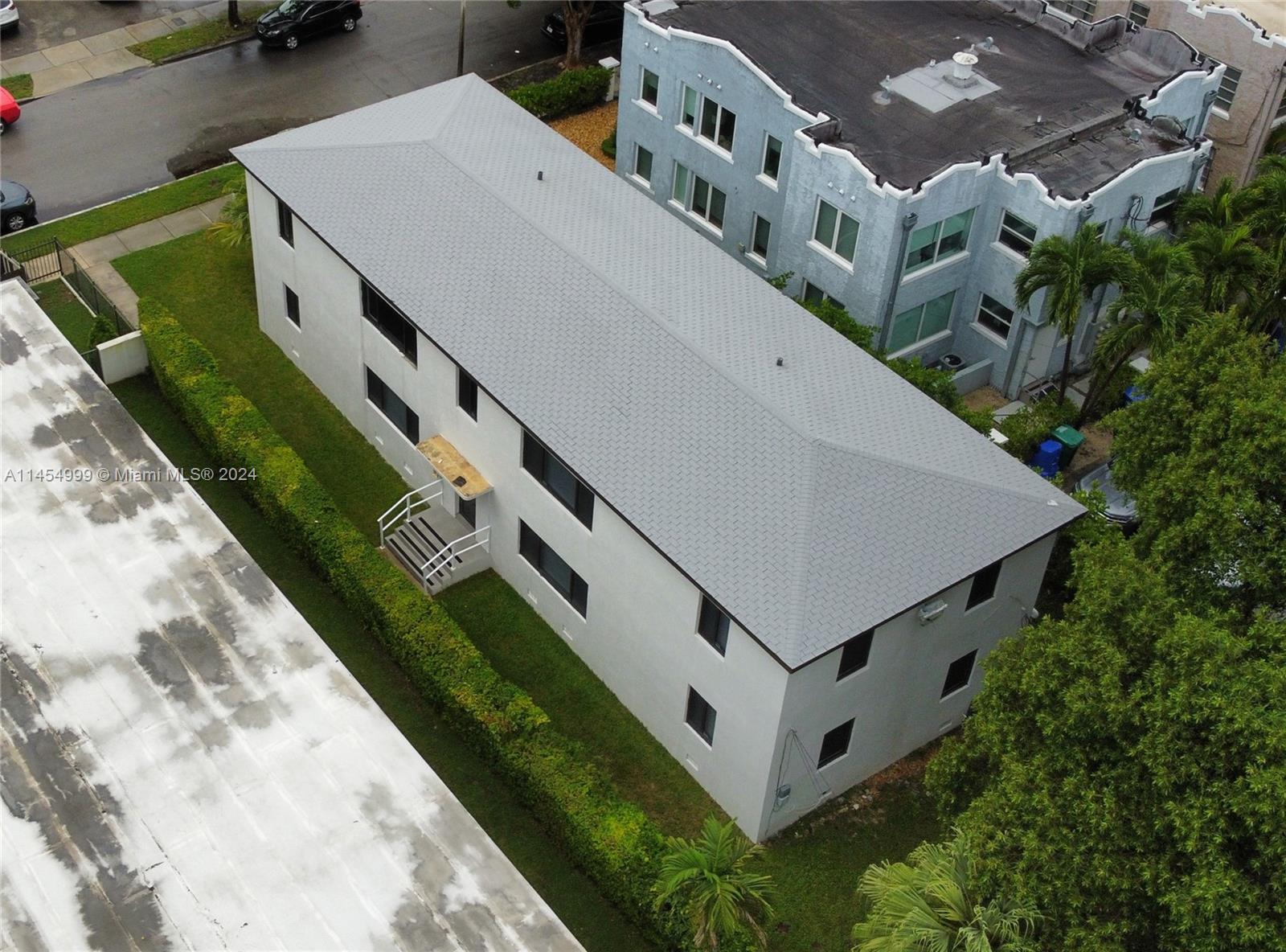 2141 Southwest 14th Terrace Miami, FL 33145 - Photo 39 of 47 an aerial view of a house with a yard and potted plants