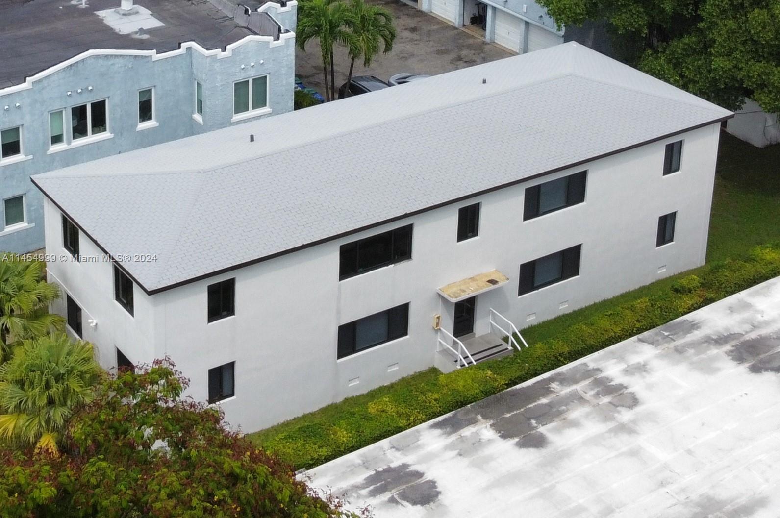 2141 Southwest 14th Terrace Miami, FL 33145 - Photo 44 of 47 a view of building with yard
