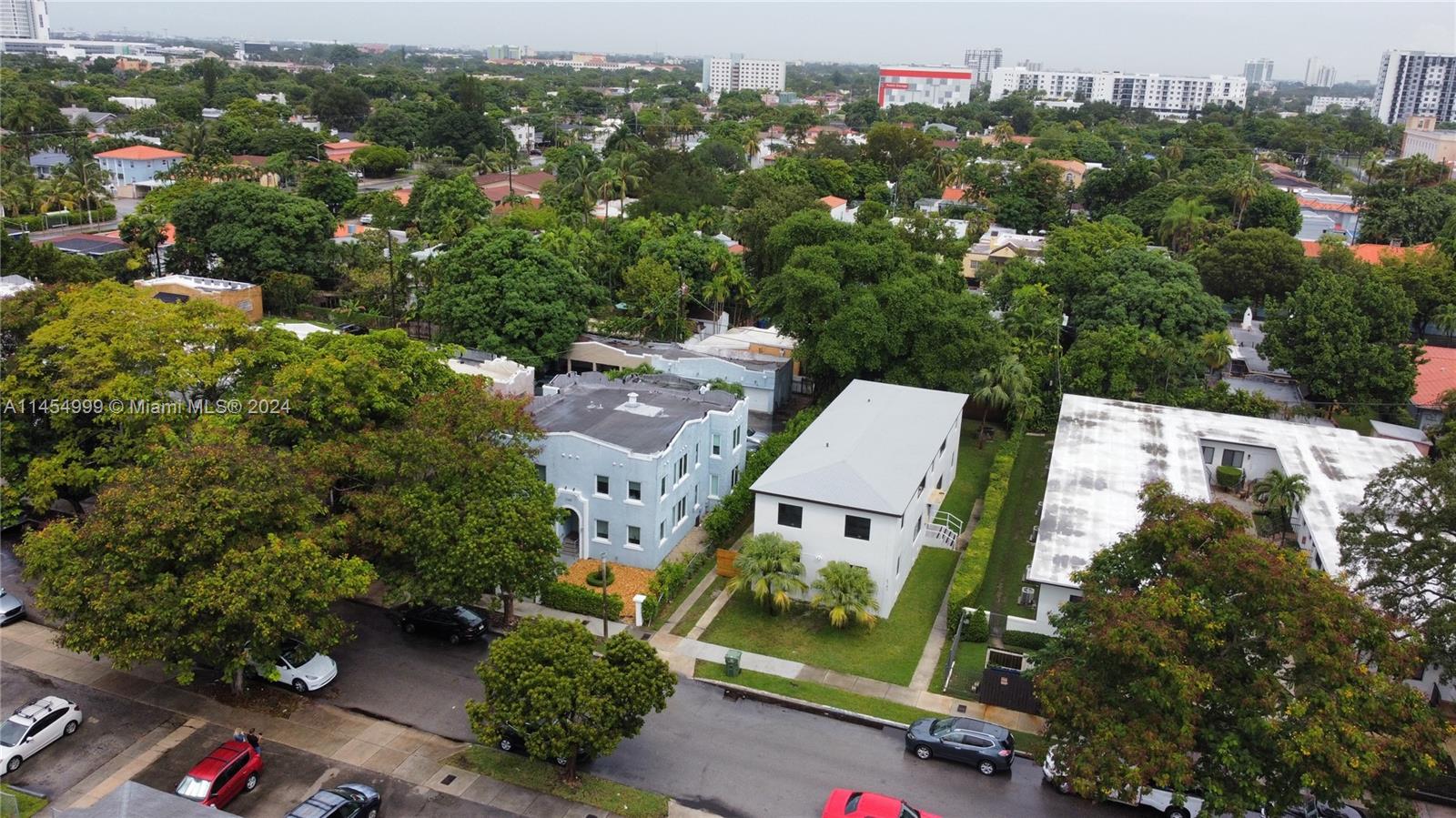 2141 Southwest 14th Terrace Miami, FL 33145 - Photo 45 of 47 an aerial view of multiple houses with a yard