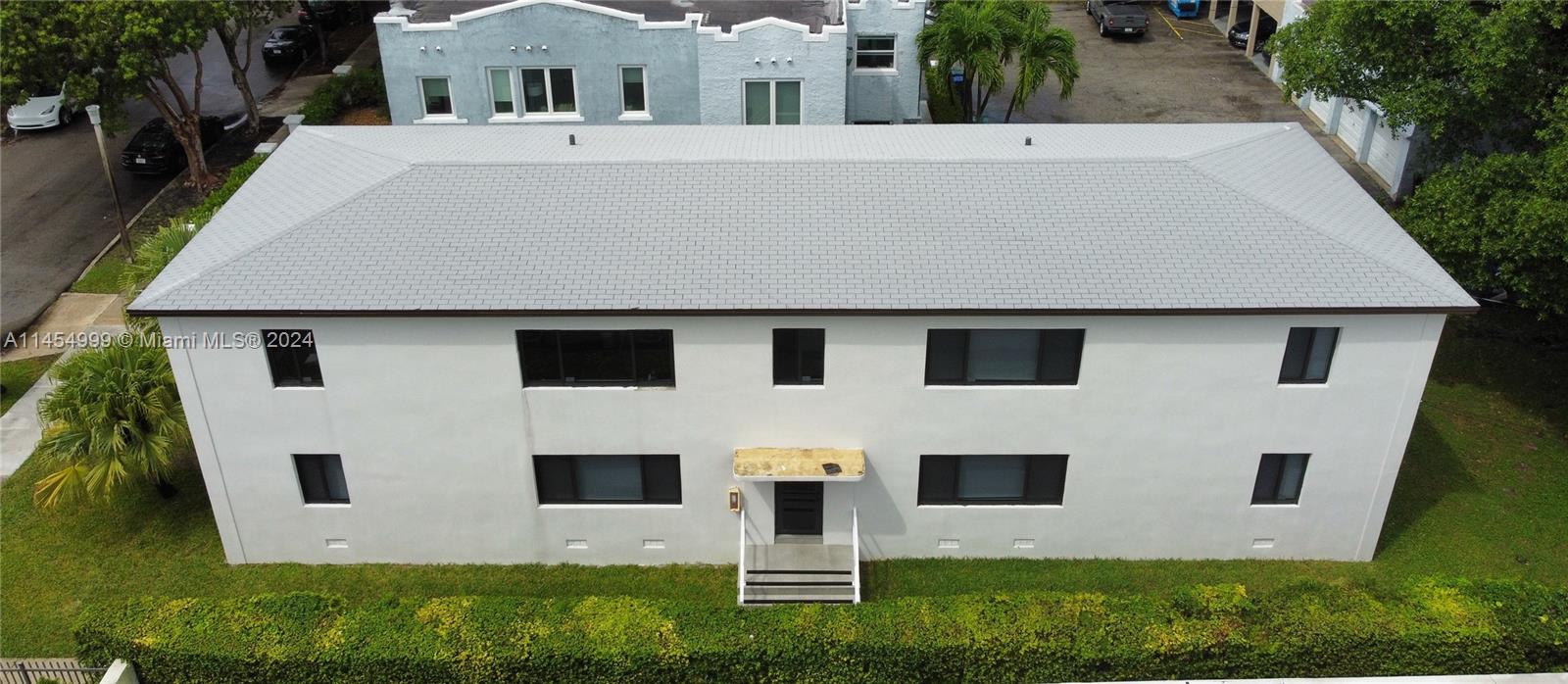 2141 Southwest 14th Terrace Miami, FL 33145 - Photo 47 of 47 a aerial view of a white house with a yard and large tree