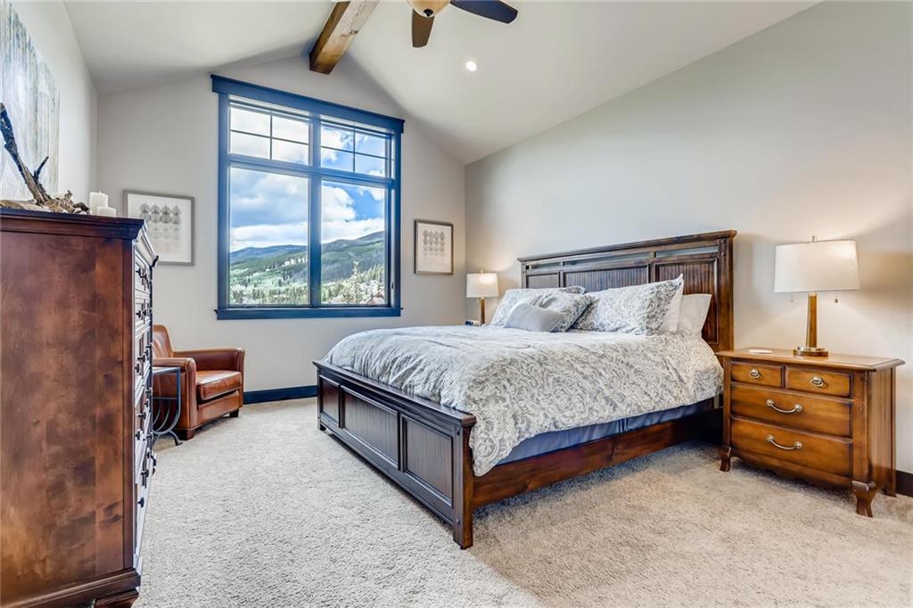 851 Independence Road, Unit 5A Keystone, CO 80435 - Photo 11 of 28 a spacious bedroom with a bed and a couch