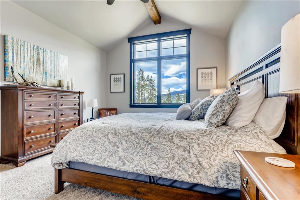 851 Independence Road, Unit 5A Keystone, CO 80435 - Photo 12 of 28 a bedroom with a bed and a dresser