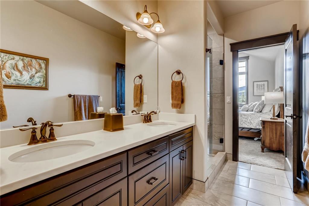 851 Independence Road, Unit 5A Keystone, CO 80435 - Photo 14 of 28 a bathroom with a sink and a mirror