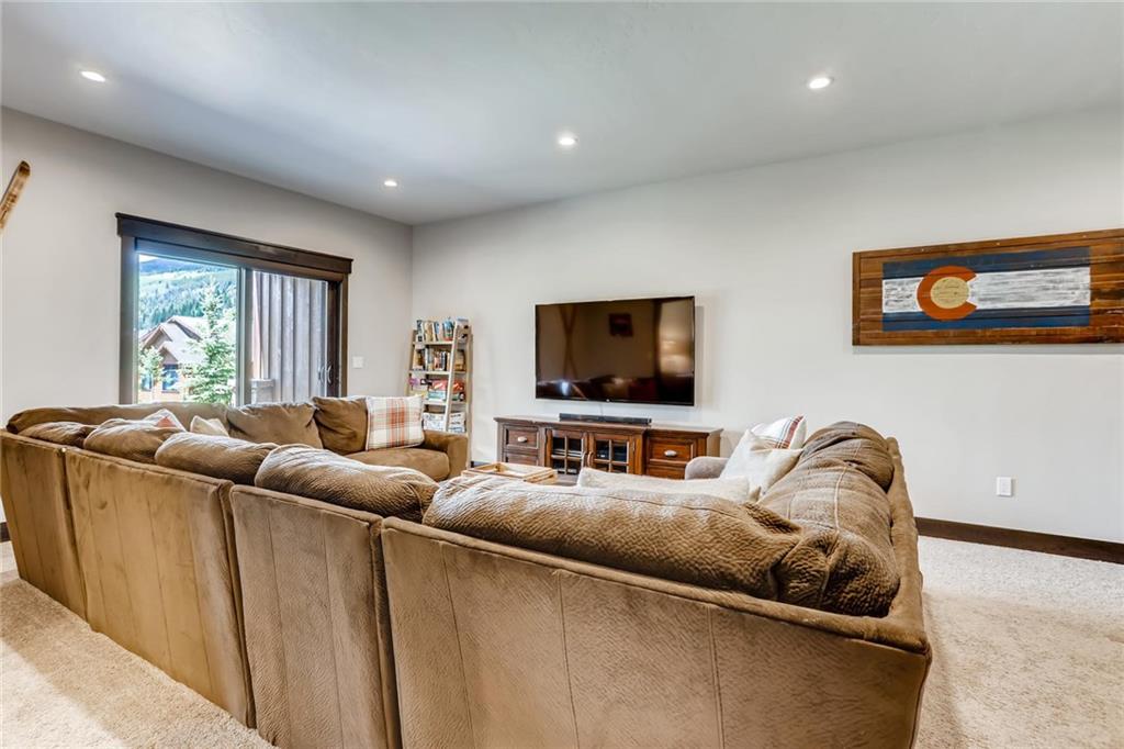 851 Independence Road, Unit 5A Keystone, CO 80435 - Photo 16 of 28 a living room with furniture and a flat screen tv