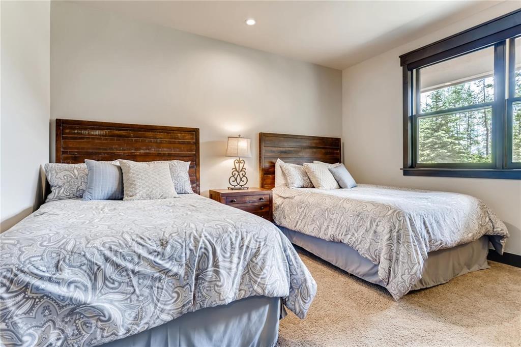 851 Independence Road, Unit 5A Keystone, CO 80435 - Photo 18 of 28 a bedroom with two beds and window