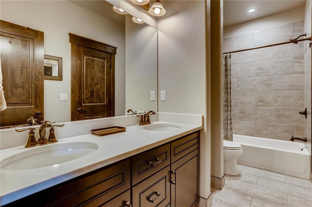 851 Independence Road, Unit 5A Keystone, CO 80435 - Photo 19 of 28 a bathroom with a sink and a mirror