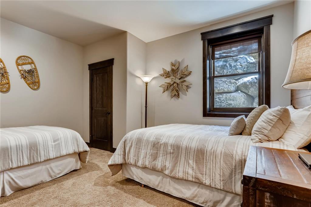 851 Independence Road, Unit 5A Keystone, CO 80435 - Photo 22 of 28 a bedroom with a bed and window