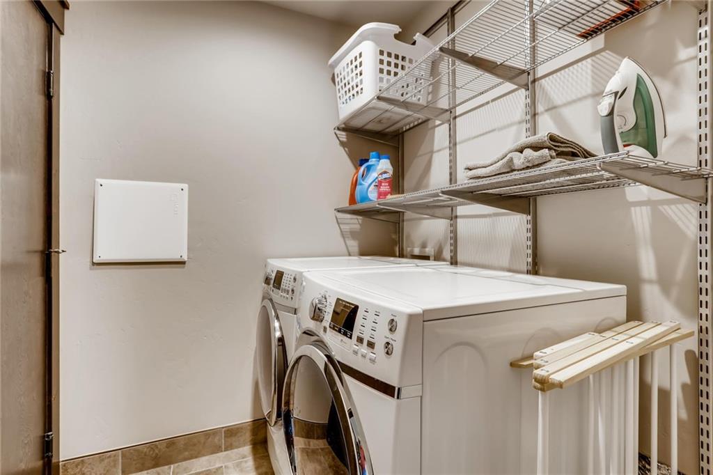 851 Independence Road, Unit 5A Keystone, CO 80435 - Photo 24 of 28 a utility room with dryer and washer