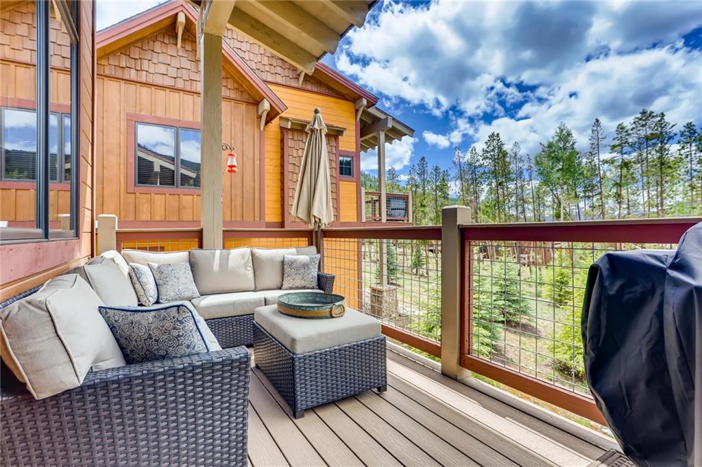 851 Independence Road, Unit 5A Keystone, CO 80435 - Photo 25 of 28 a balcony with furniture and wooden floor