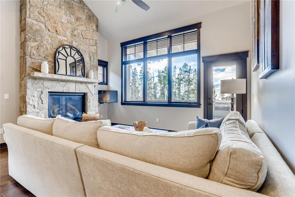 851 Independence Road, Unit 5A Keystone, CO 80435 - Photo 5 of 28 a living room with furniture and a fireplace