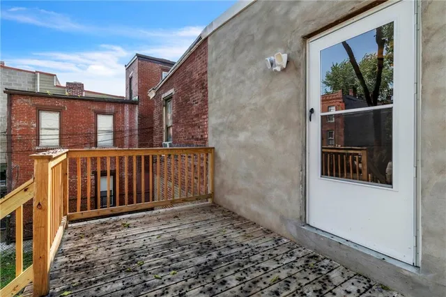 a view of a brick house with a window