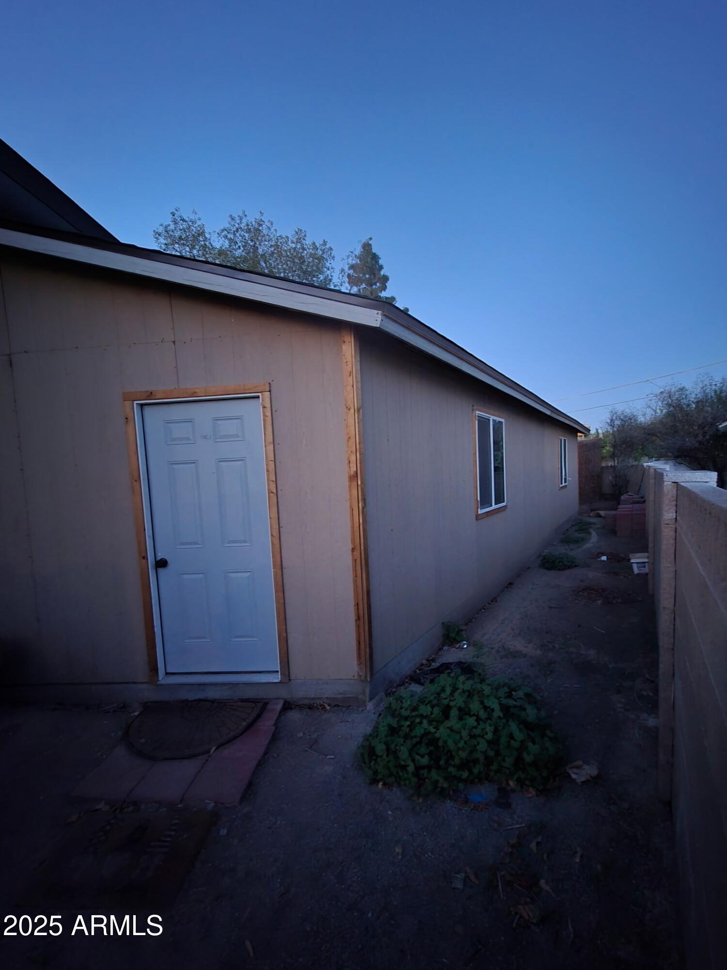 4216 West Solano Drive Phoenix, AZ 85019 - Photo 11 of 13 a backyard of a house