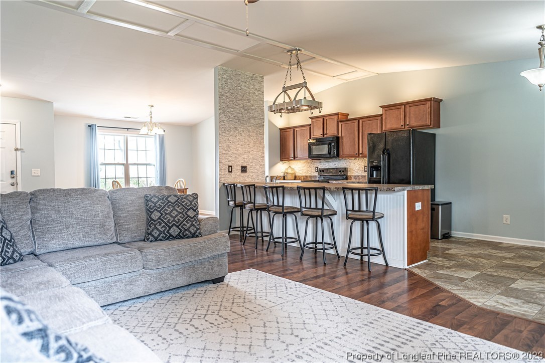 20 Old English Lane Spring Lake, NC 28390 - Photo 18 of 41 a living room with furniture and a wooden floor