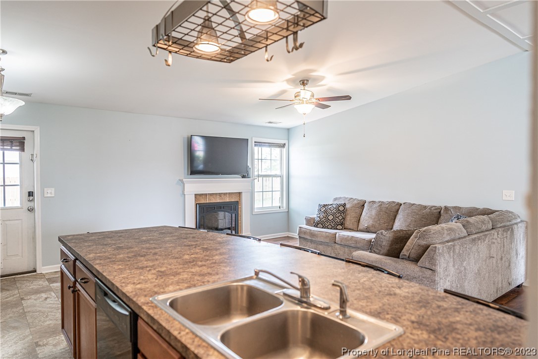 20 Old English Lane Spring Lake, NC 28390 - Photo 20 of 41 a living room with furniture and a fireplace