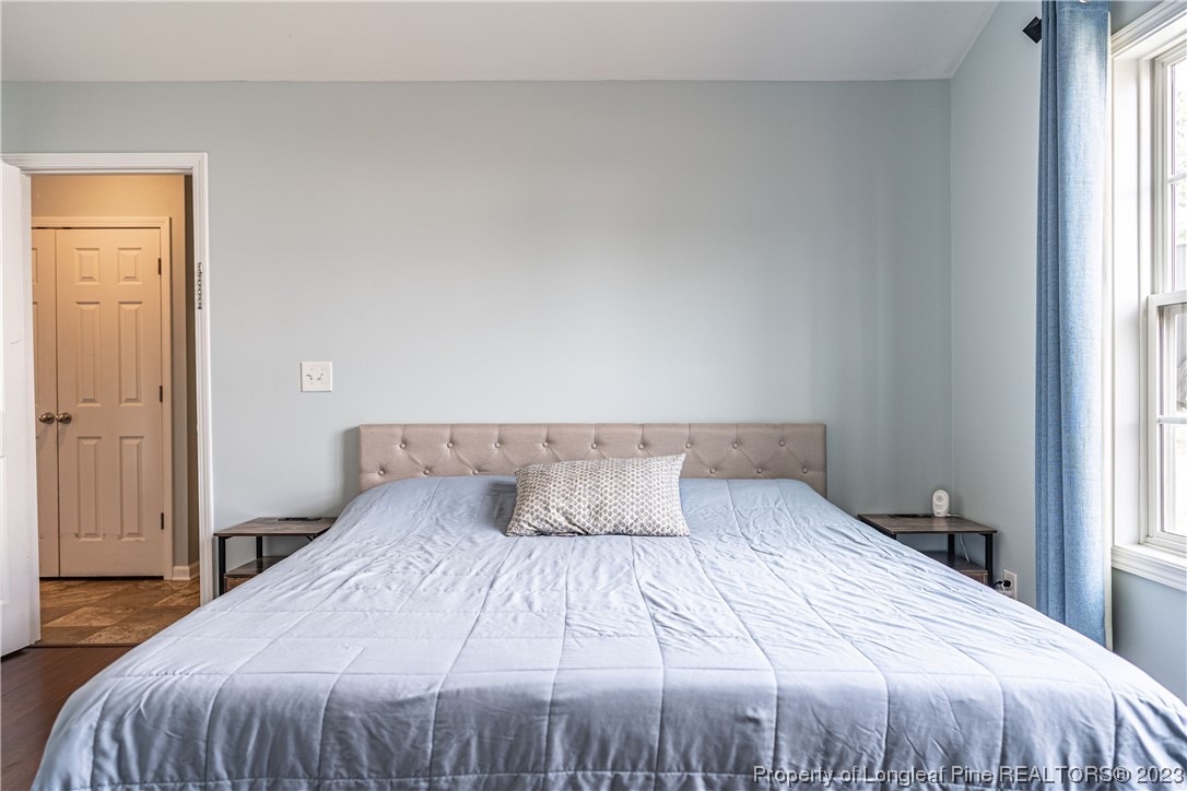20 Old English Lane Spring Lake, NC 28390 - Photo 25 of 41 a bedroom with a bed and a window