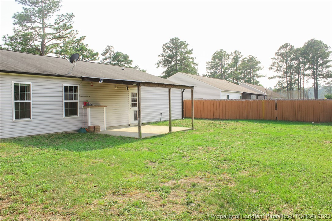 20 Old English Lane Spring Lake, NC 28390 - Photo 3 of 41 a view of a backyard with a garden
