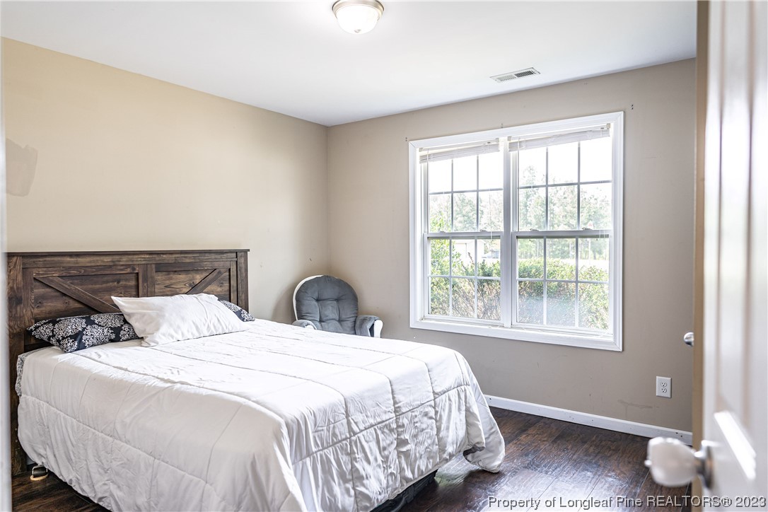 20 Old English Lane Spring Lake, NC 28390 - Photo 33 of 41 a bedroom with a bed and a window