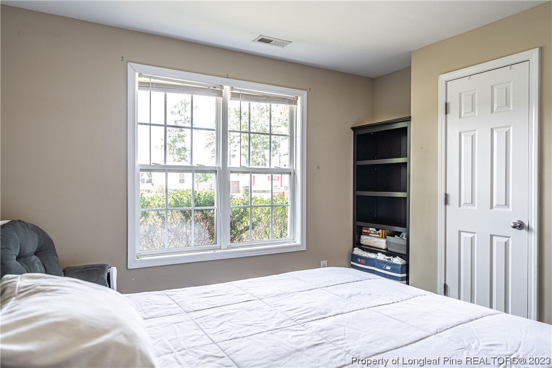 20 Old English Lane Spring Lake, NC 28390 - Photo 35 of 41 a bedroom with a bed and a window