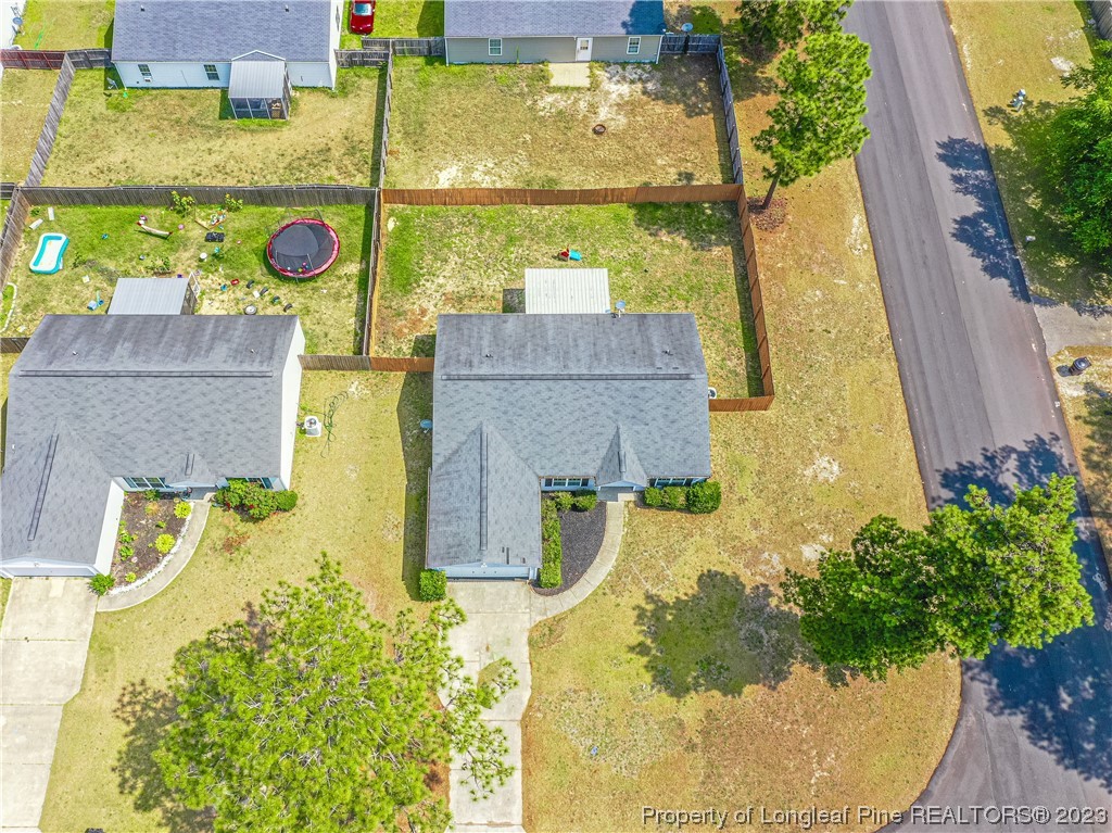 20 Old English Lane Spring Lake, NC 28390 - Photo 5 of 41 a aerial view of a house with a garden and plants