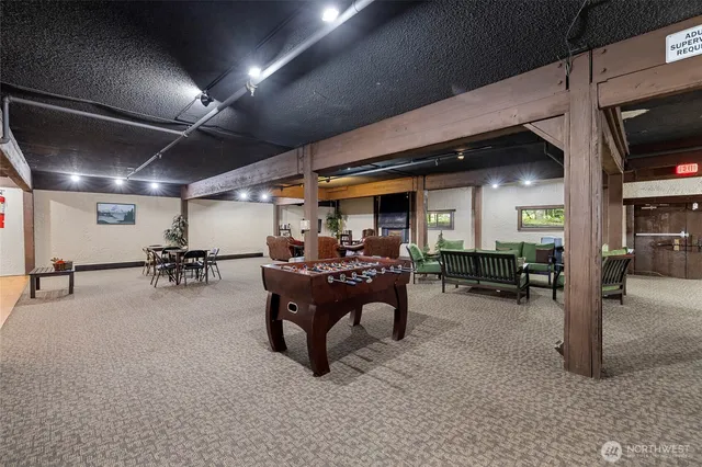 a room with furniture and a flat screen tv