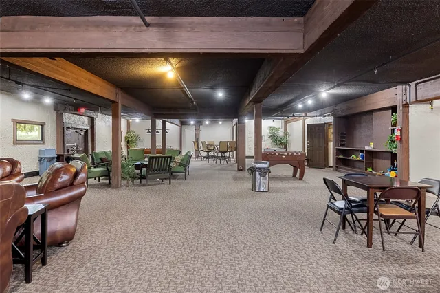 a living room with furniture and a view