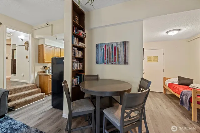 a view of a livingroom with furniture and wooden floor