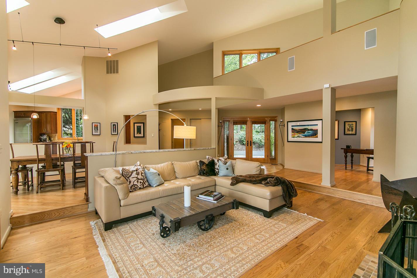 11580 Lake Newport Road Reston, VA 20194 - Photo 12 of 30 a living room with furniture or couch and a dining table