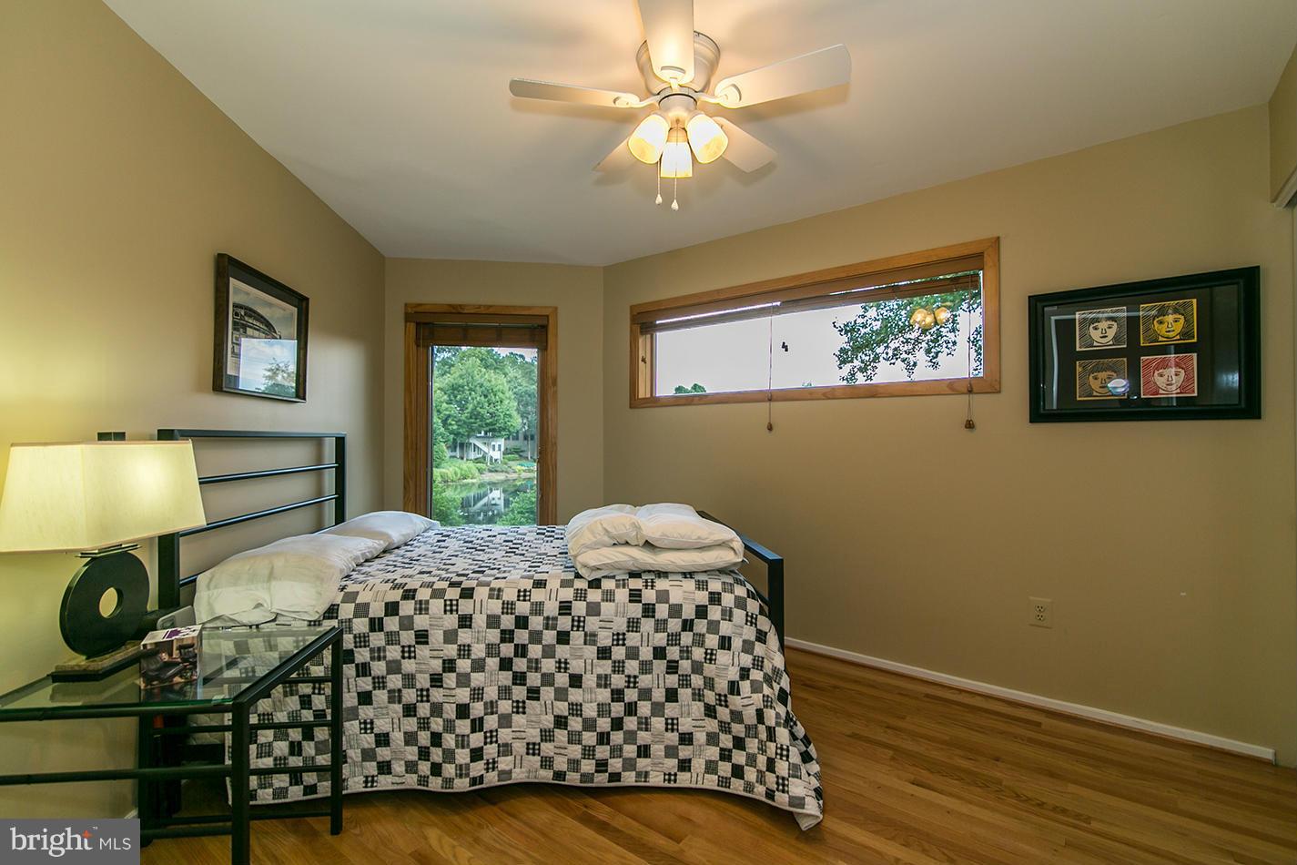 11580 Lake Newport Road Reston, VA 20194 - Photo 26 of 30 a bedroom with a bed and a window