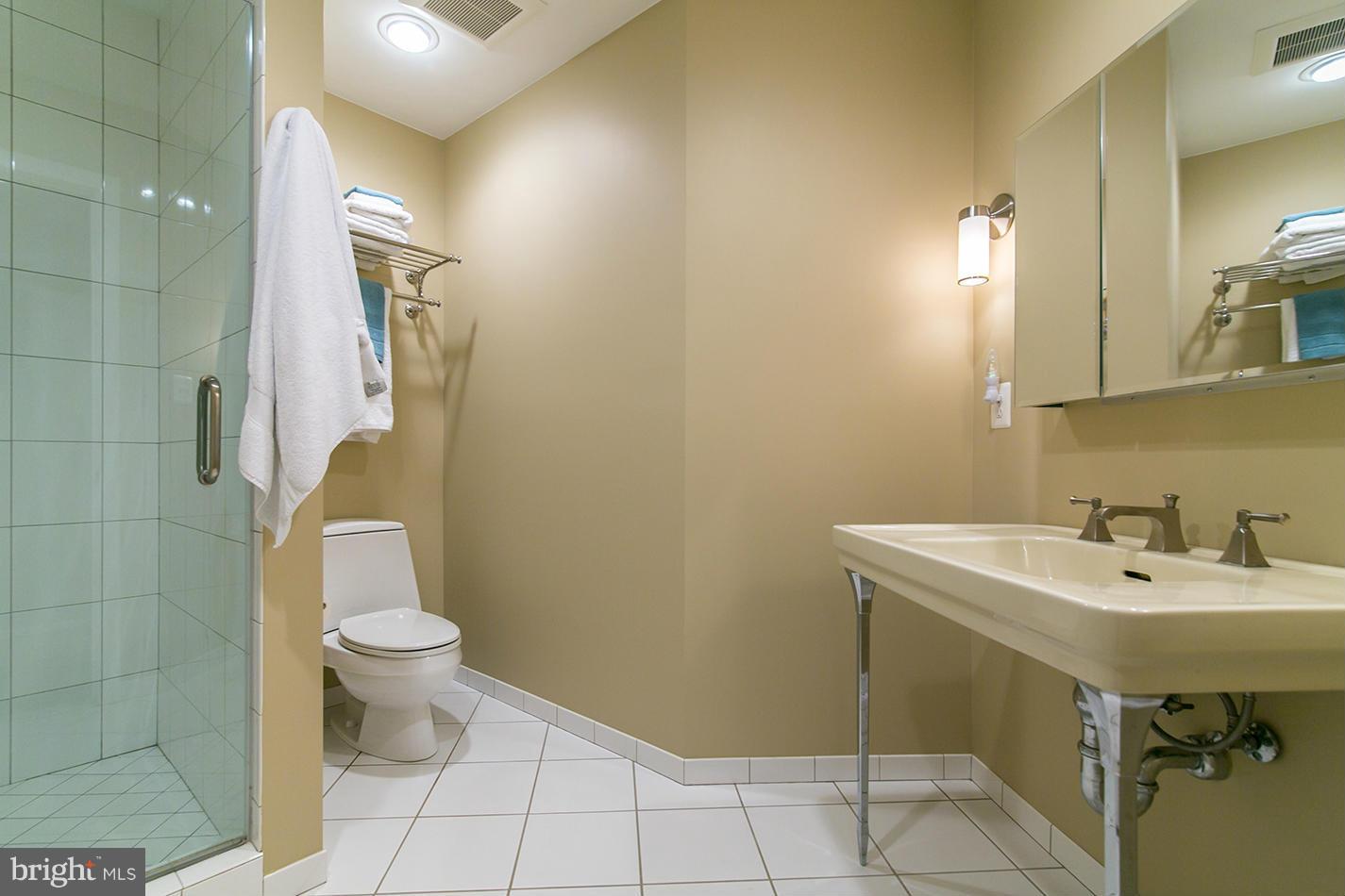 11580 Lake Newport Road Reston, VA 20194 - Photo 27 of 30 a bathroom with a sink toilet and shower